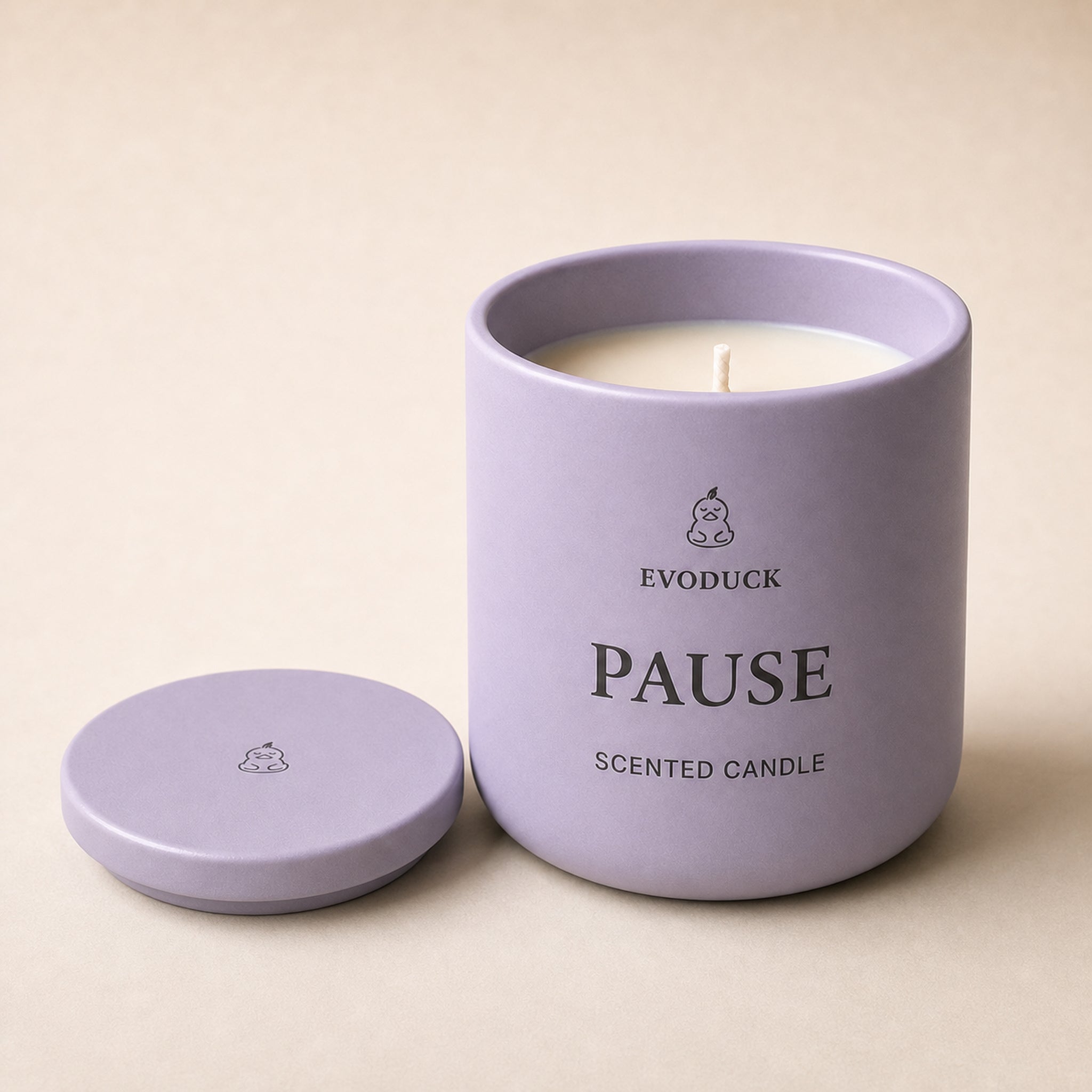 EVODUCK PAUSE Scented Candle hero image in lavender matte ceramic vessel with wax and wick